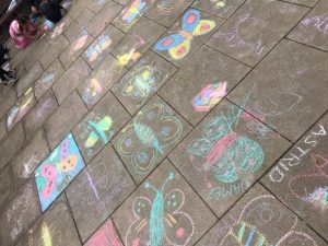 Children's chalk drawings of butterflies