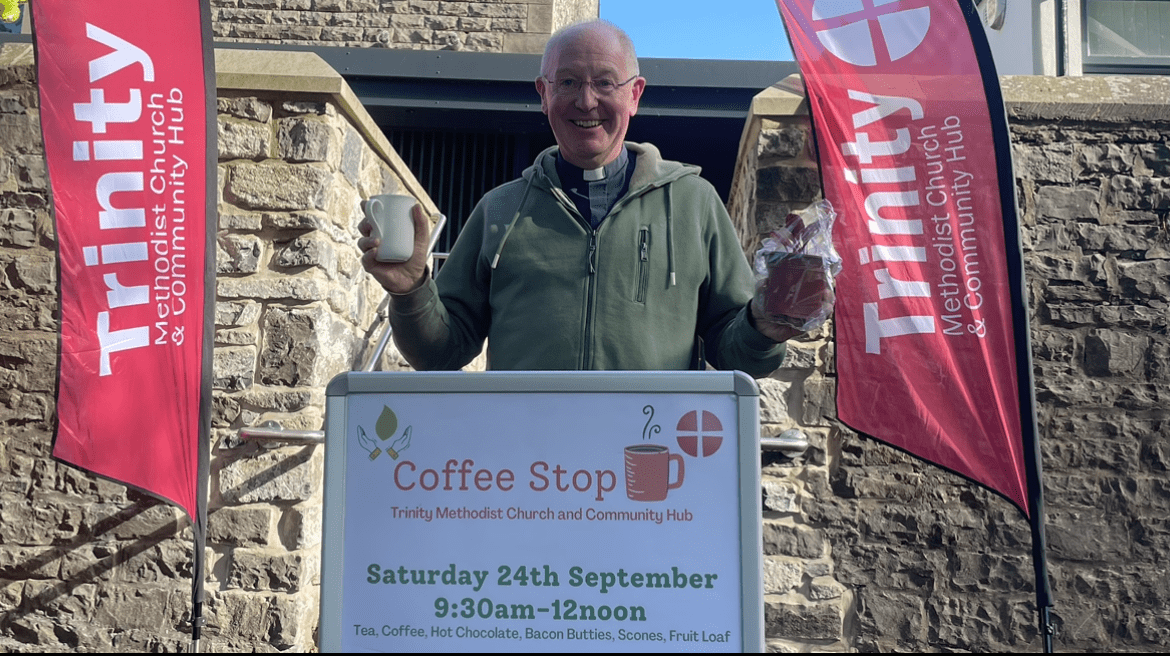 Rev Ian outside the Eco Coffee Stop Rev Ian outside the Eco Coffee Stop